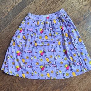 LINDY BOP ‘PRYIA' MID-CENTURY INSPIRED SWING SKIRT IN PINK SUMMER COCKTAIL PRINT